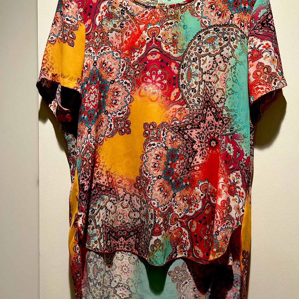 Very comfortable, short sleeve multi-colored, loose top to wear with everything